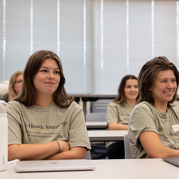 Students learning in an education program